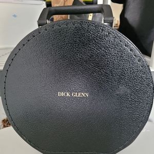 Vintage zippered round hat box/ cosmetics case/45 record case or purse.